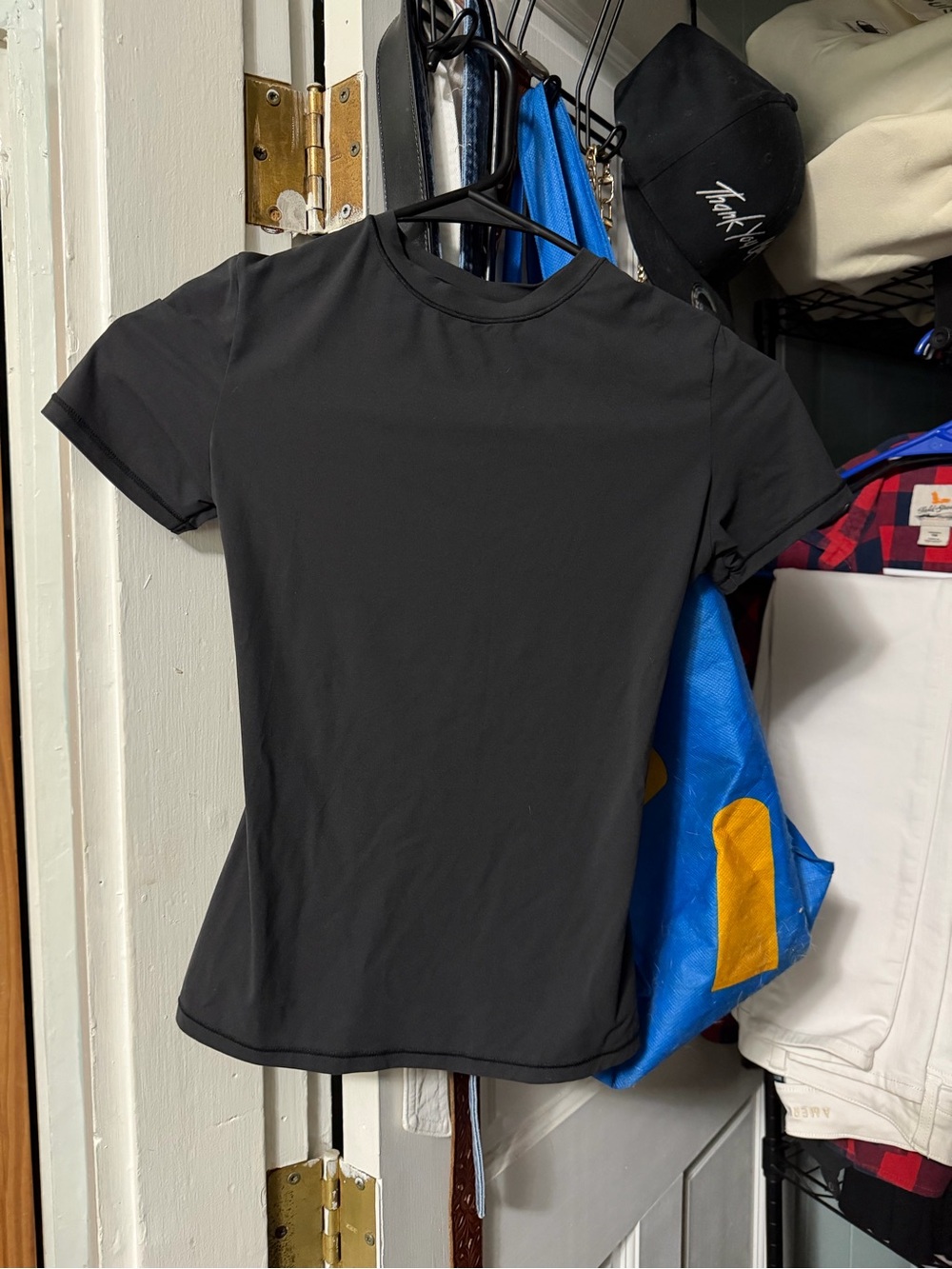 SKIMS Black Short Sleeve Crewneck Tee fits everyone tee.